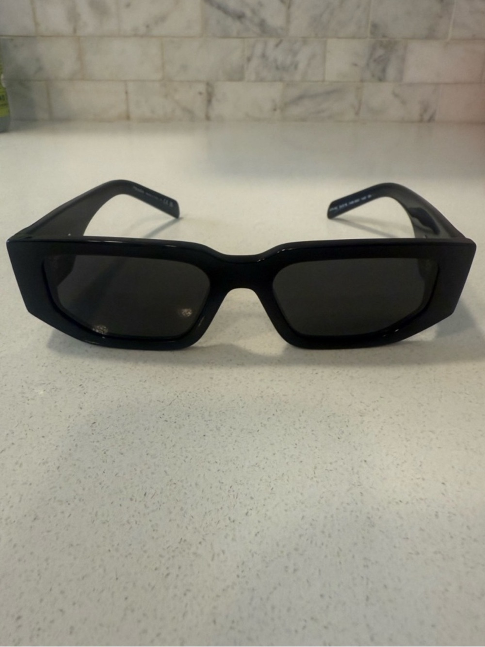 Black Prada triangle logo sunglasses